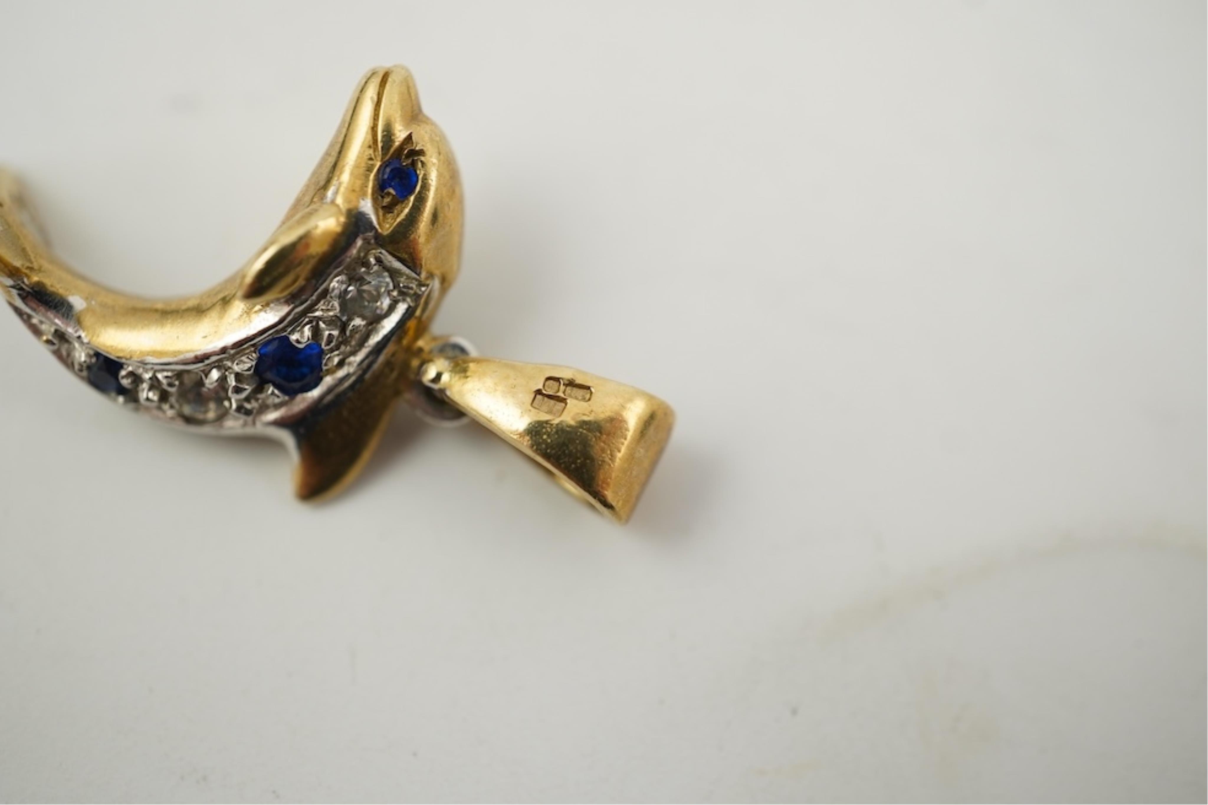 Five assorted modern 375 yellow metal and gem set pendants, a yellow metal and lapis lazuli set pendant (stamped 585?) 40mm, together with a yellow metal dragonfly brooch, a similar small pendant and a white metal bracel